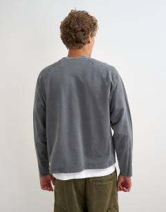 Model wearing Relaxed fit crop long sleeve t-shirt with panel detail in washed grey