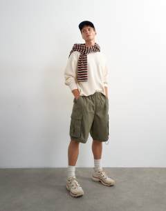 Model wearing Relaxed fit crop pique waffle long sleeve t-shirt in ecru