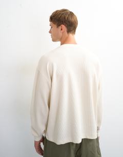 Model wearing Relaxed fit crop pique waffle long sleeve t-shirt in ecru