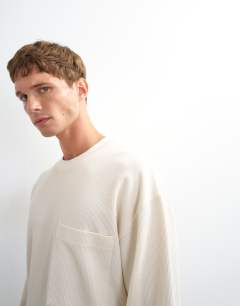 Model wearing Relaxed fit crop pique waffle long sleeve t-shirt in ecru