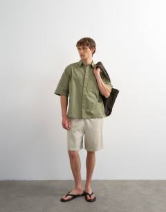 Relaxed fit crop short sleeve herringbone overshirt in olive green