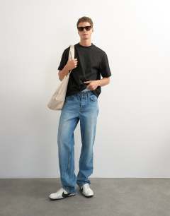 Model wearing Relaxed fit crop t-shirt in black