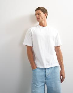 Model wearing Relaxed fit crop t-shirt in white