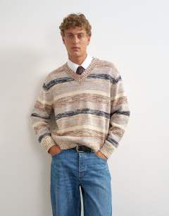 Model wearing Relaxed fit crop v neck jumper with twist in multi