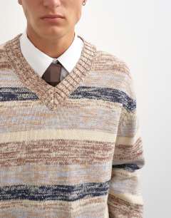 Model wearing Relaxed fit crop v neck jumper with twist in multi