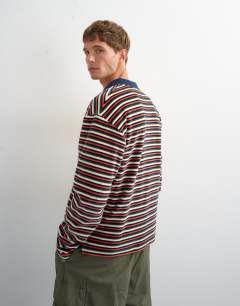 Model wearing Relaxed fit crop velour stripe polo in navy