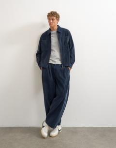 Model wearing Relaxed fit crop washed cord overshirt in washed blue