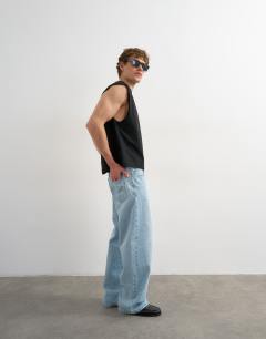 Model wearing Relaxed fit cropped sleeveless t-shirt in black