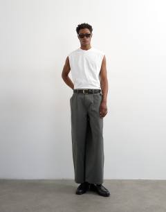 Model wearing Relaxed fit cropped sleeveless t-shirt in white