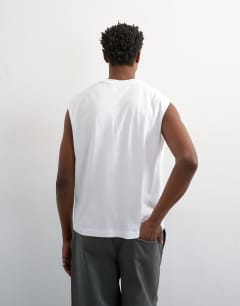 Model wearing Relaxed fit cropped sleeveless t-shirt in white