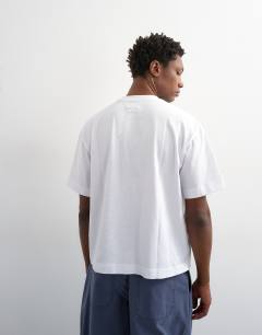 Model wearing Relaxed fit cropped t-shirt in white