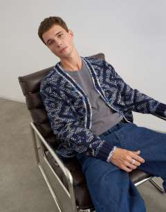 Model wearing Relaxed fit diamond knitted cardigan in navy