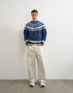 Model wearing Relaxed fit fairisle knitted jumper in navy