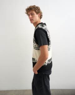 Model wearing Relaxed fit fairisle knitted v neck tank in black