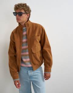 Model wearing Relaxed fit faux suede funnel neck bomber with double zip in tan