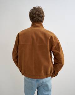 Model wearing Relaxed fit faux suede funnel neck bomber with double zip in tan