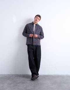Model wearing Relaxed fit flannel check shirt in brown