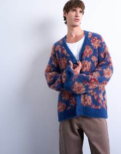 Model wearing Relaxed fit floral knit cardigan in purple
