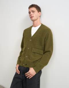 Model wearing Relaxed fit fluffy double pocket knitted cardigan in khaki