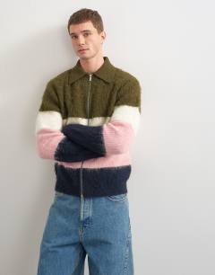 Model wearing Relaxed fit fluffy knitted zip through stripe polo in multi