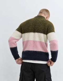Model wearing Relaxed fit fluffy knitted zip through stripe polo in multi