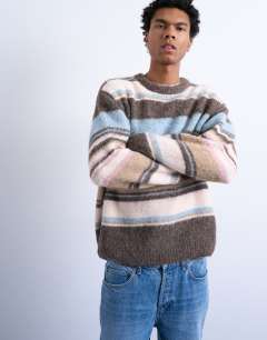 Model wearing Relaxed fit fluffy stripe knitted jumper in brown