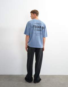 Model wearing Relaxed fit front and back social club print t-shirt in blue