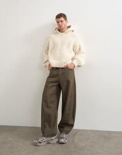 Model wearing Relaxed fit hand knitted heavyweight hoodie in ecru