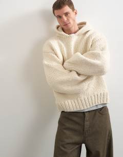 Model wearing Relaxed fit hand knitted heavyweight hoodie in ecru