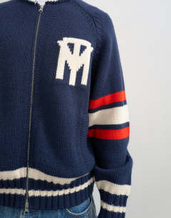 Model wearing Relaxed fit heavyweight knit varsity cardigan in navy