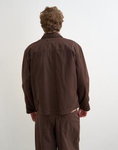 Model wearing Relaxed fit herringbone overshirt in brown