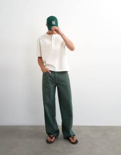 Model wearing Relaxed fit jersey twill baseball henley shirt in ecru