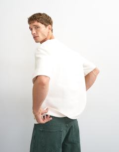 Model wearing Relaxed fit jersey twill baseball henley shirt in ecru