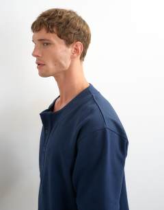 Model wearing Relaxed fit jersey twill baseball henley shirt in navy