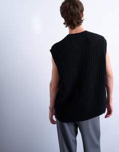 Model wearing Relaxed fit knitted cable tank in black