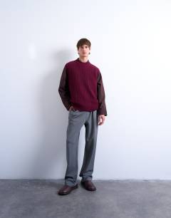 Model wearing Relaxed fit knitted cable tank in burgundy