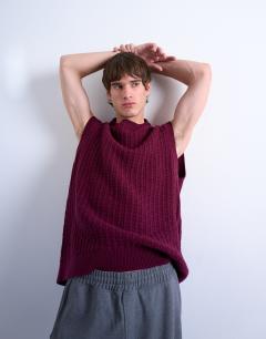 Model wearing Relaxed fit knitted cable tank in burgundy