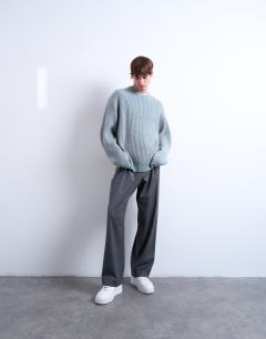 Model wearing Relaxed fit knitted fisherman jumper in washed blue