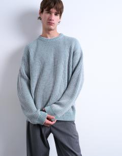 Model wearing Relaxed fit knitted fisherman jumper in washed blue
