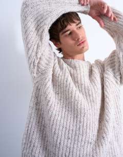 Model wearing Relaxed fit knitted jumper with nep in ecru
