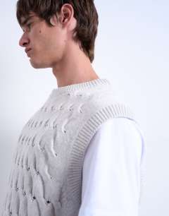 Model wearing Relaxed fit knitted pleat tank in grey