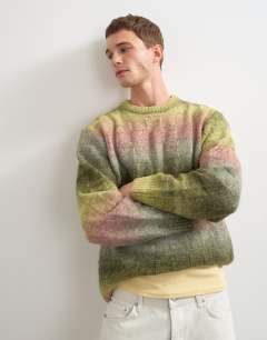 Model wearing Relaxed fit knitted space dye knitted jumper with check design in green