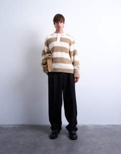 Model wearing Relaxed fit knitted stripe polo jumper in brown