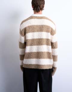 Model wearing Relaxed fit knitted stripe polo jumper in brown