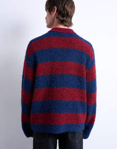 Model wearing Relaxed fit knitted stripe polo jumper in burgundy