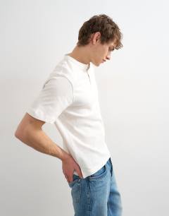 Model wearing Relaxed fit linen mix henley t-shirt in ecru