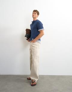 Model wearing Relaxed fit linen mix henley t-shirt in navy
