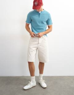 Model wearing Relaxed fit linen mix henley t-shirt in petrol blue