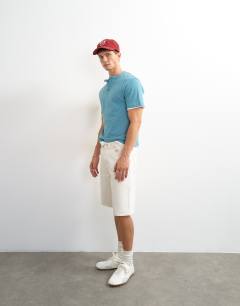 Model wearing Relaxed fit linen mix henley t-shirt in petrol blue