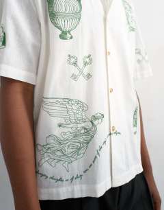 Model wearing Relaxed fit linen mix shirt with all over placement embroidery in ecru